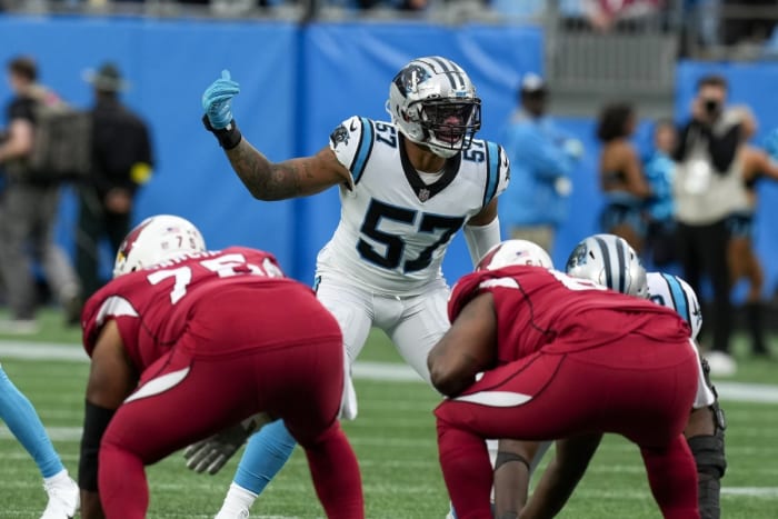 Carolina Panthers linebacker Damien Wilson (57) motions to his teammates against the Arizona Cardinals. Mandatory Credit: Jim Dedmon-USA TODAY